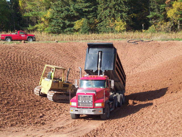 Manitowoc area excavator and tiling company pond construction